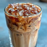 Iced Brown Sugar Oat Milk Shaken Espresso, brilliantly layered with sweet, rich espresso.