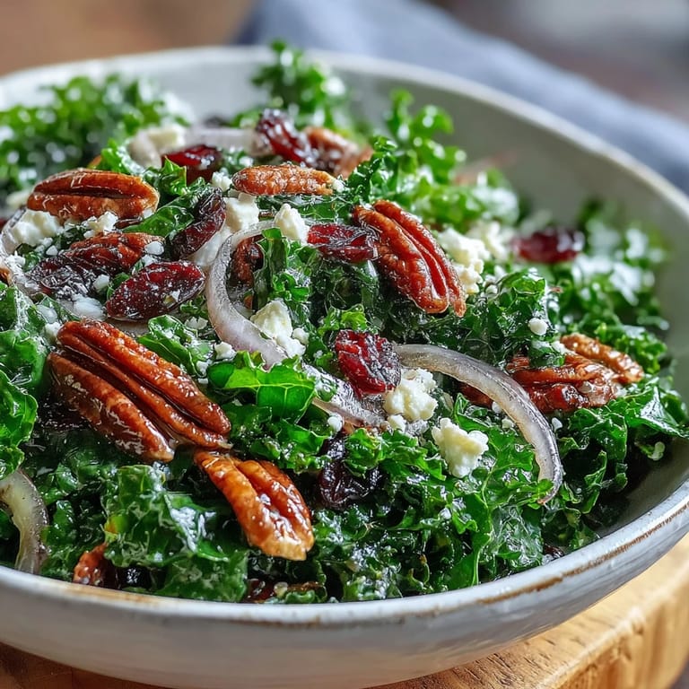 Hearty vegetarian salad topped with walnuts, cranberries, and a glossy maple-mustard dressing.